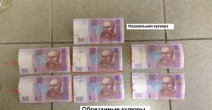 Киевлянам попадаются обрезанные купюры с востока Украины